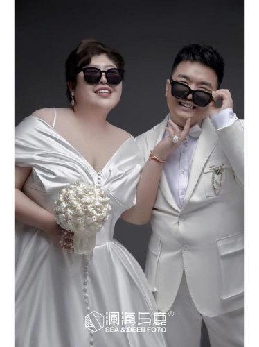 婚纱照怎么那么胖啊